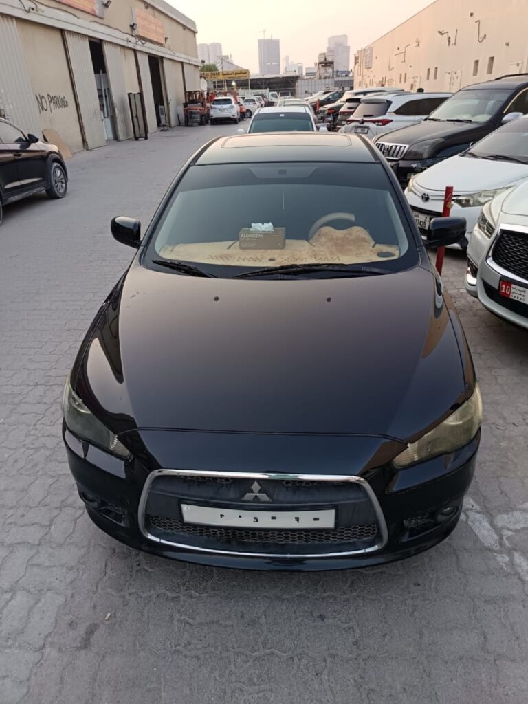 Mitsubishi lancer 2013 for sale in Sharjah, UAE – photo 1 of 3